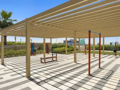 a pavilion with a bench in a playground at Modern 1BR at Golf Vita A in Damac Hills Near Golf in Dubai