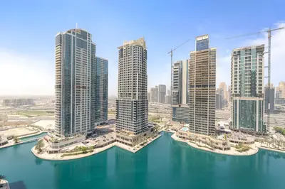 a rendering of a city with tall buildings at Stylish 2BR in Royal MBL in Dubai