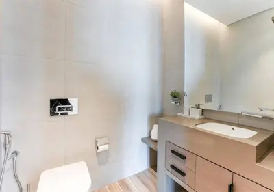 a bathroom with a sink and a mirror at Modern Stay at The Address JBR in Dubai