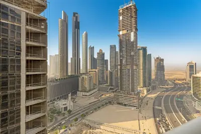 a view of a city skyline with tall buildings at super Luxurious Apartment Downtown Dubai Mall burj khalifa DIFC in Dubai