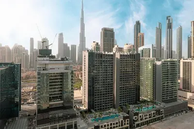 a view of a large city with tall buildings at Burj Khalifa View - 4 min Dubai Mall - SwimingPool - Business Bay in Dubai