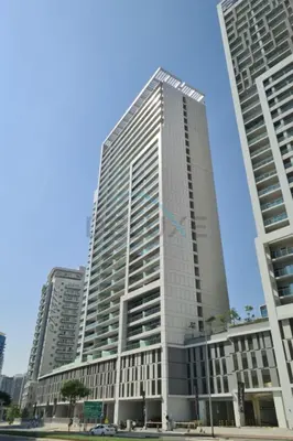 a tall building in a city with two tall buildings at City and Burj Khalifa View 2BR, Near Dubai Water Canal, Vera Tower, Business Bay by Deluxe Holiday Homes in Dubai