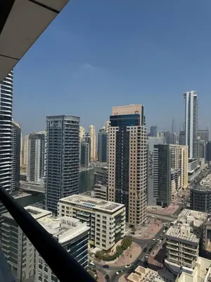 a view of a city with tall buildings at IDLE 1Bed Marina POOL &JBR BEACH in Dubai