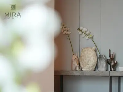 a shelf with vases and other items on it at Mira Holiday Homes - Lovely and luxury 1 bedroom in Address JBR in Dubai