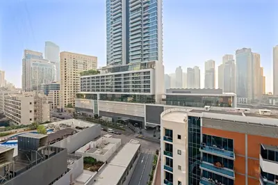 an aerial view of a city with tall buildings at Dubai Marina Luxury 2BR with Pool, Gym & Near JBR Beach, Metro in Dubai
