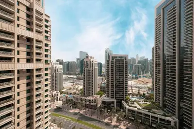 an aerial view of a city with tall buildings at Act One Act Two - Close to Dubai Mall & Burj Khalifa - Downtown Dubai - Luxury Apartments by Canvas Holiday Homes in Dubai