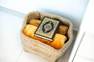 a basket filled with breads in a room at Cozy Studio 7 Minutes From Dubai Mail in Dubai