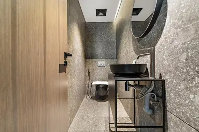 a bathroom with a sink and a mirror at Chic 2BR Close to Burj Khalifa, Dubai Mall & Creek in Dubai