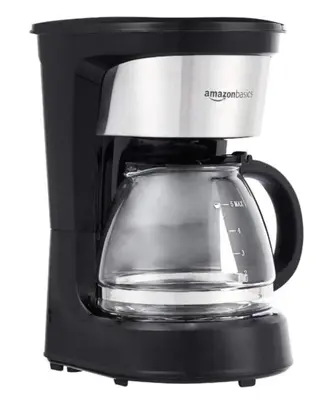 a black coffee maker with a glass pot at Luxury Apartment- 5 min Walking Distance Beach and 3 minutes walking distance Metro in Dubai