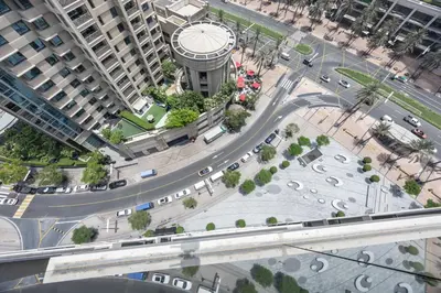 an aerial view of a city with a road and buildings at Act tower-1BR near burj khalifa in Dubai