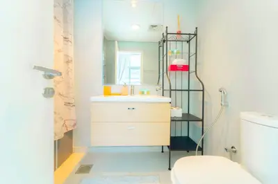 a bathroom with a sink and a mirror at AWS Holiday Homes - Charming stay near Golf Course in Dubai