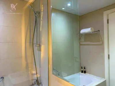 a bathroom with a shower and a sink at Bellaviu Holiday Homes Peaceful Escape at DAMAC Maison Prive in Dubai