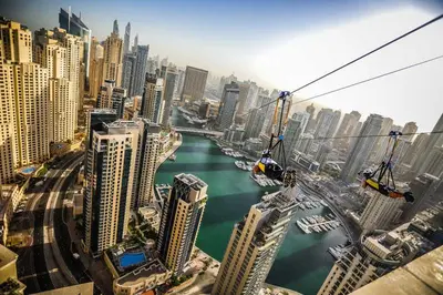 a view of a city with a river and buildings at Single Bed In Twin Room With Balcony For Female Guests Only in Dubai