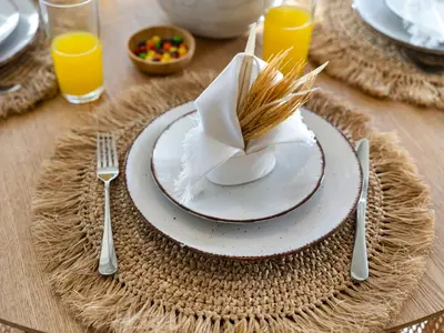 a table with a plate with a bunch of food on it at Luxury Spacious 2 Bedroom Private Beach and Views in Dubai