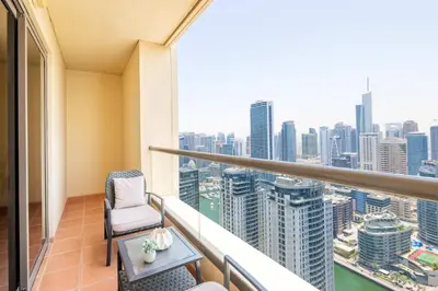 a balcony with a view of the city at Luxury JBR 2BR Shams Full Marina View Free 5 Star Beach Resorts Access in Dubai