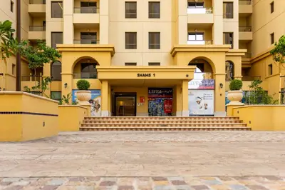 a building with stairs in front of it at 2Br Panoramic sea view, Ain Dubai, Palm, JBR beach in Dubai