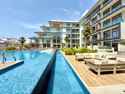 an image of a swimming pool at a building at Elegant and Cozy Studio Apartment - Amenities Access in Dubai