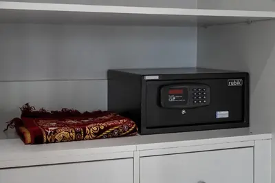 a microwave sitting on top of a counter at Luxury JLT 1BR Lakeview 5 min Metro & Marina in Dubai