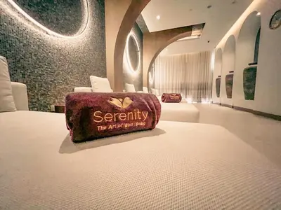 a hotel room with a bed with a sign on it at Palm Jumeirah Beach Paradise at Fairmont Residence in Dubai