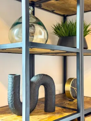a shelf with a sculpture of a number on it at Modern & Luxury 1BR -Pool View - Kensington Waters in Dubai
