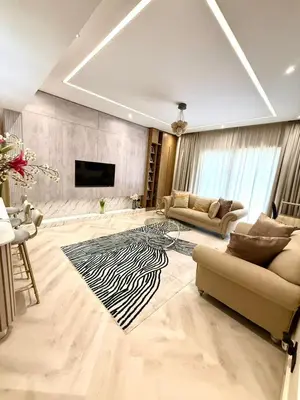 a living room with a zebra rug on the floor at Cozy, Fully Fitted Smart Home in Dubai