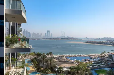 a view of the city and the ocean from a building at Modern 1BD, beautiful SeaView, Pool & Beach access in Dubai