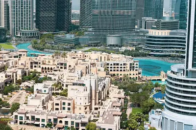 an aerial view of a city with tall buildings at Lux apartment with full Burj View - 5 min walk to Dubai Mall in Dubai