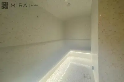 a bath tub in the corner of a room at Stylish 1BR in Peninsula Five Views & Pool in Dubai