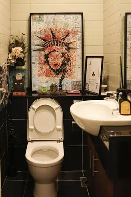 a bathroom with a toilet and a sink at Marina Mirage in Dubai