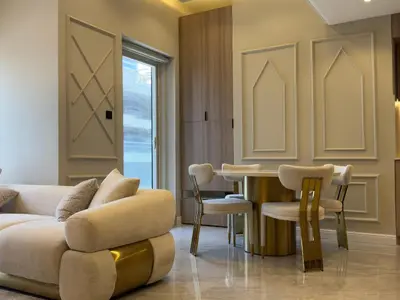 a living room with a couch and a table at A unique luxury touch in JLT in Dubai