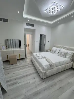 a large white bedroom with a large bed in it at Icon tower 1 , JLT 1BHK apartment in Dubai