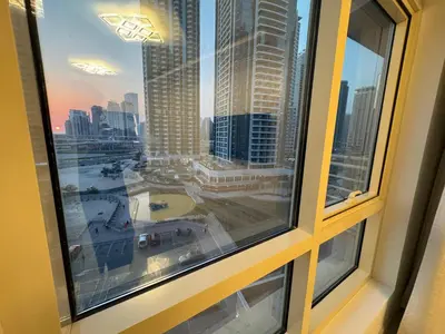 a view of a city from a window at Icon tower 1 , JLT 1BHK apartment in Dubai