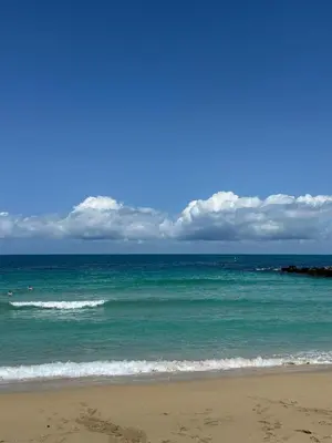a view of the ocean from the beach at 2BR by Sea, 15min to Dubai Mall in Dubai