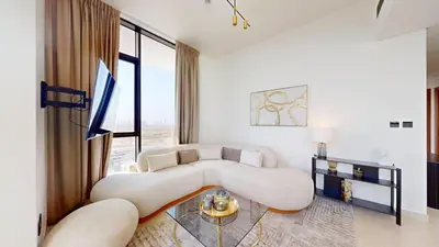 a living room with a couch and a tv at Binghatti House - Two Bedroom with Private Pool in Dubai