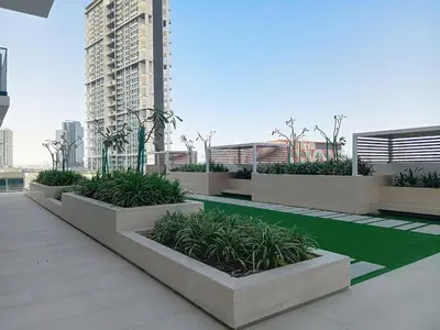 a row of planters with plants on a building at Binghatti House - Two Bedroom with Private Pool in Dubai