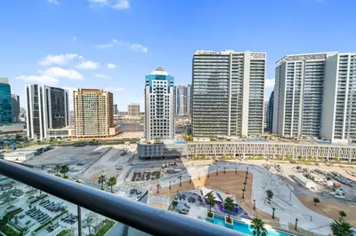 a view of a city skyline with tall buildings at Luxurious New Studio! 2 Double Beds! Sleek Design & High-End Amenities in Dubai Downtown in Dubai