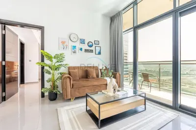 a living room with a couch and a coffee table at 2BR Near Burj Khalifa & Business Bay Metro Station, Merano Tower, Business Bay in Dubai
