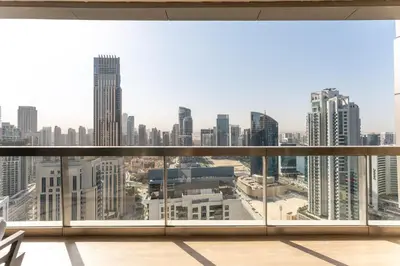 a view of a city skyline from a balcony at HAVN - Upgraded 1 Bed in 8 Boulevard Walk Downtown in Dubai