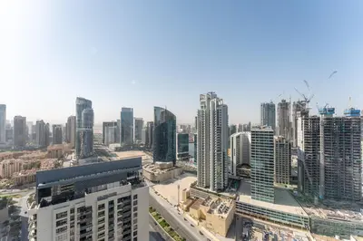 an aerial view of a city with tall buildings at HAVN - Upgraded 1 Bed in 8 Boulevard Walk Downtown in Dubai