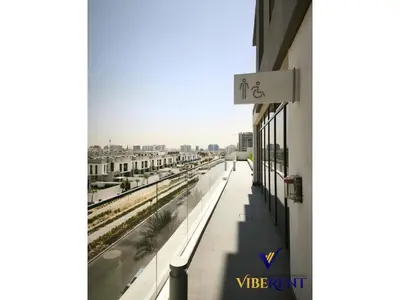a view from the balcony of a building at 2BR Sofa Bed Sleep 6 Furjan in Dubai