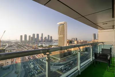 a view of a city skyline from a building at 13P-Sea View Apartment in Dubai Marina with Pool & Balcony in Dubai