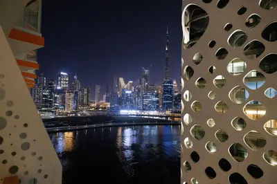 a view of a city skyline at night at 5 Min Downtown in Dubai