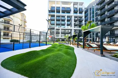 a golf course in the middle of a building at Modern Studio in Arjan by Deleguest in Dubai
