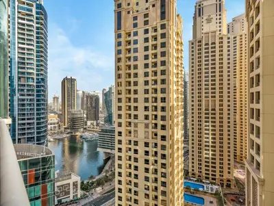 a view of a city with tall buildings and a river at WonderfulStay at Marine Towers - Full Ain & Marina View - JBR Grande Living - Brand New Apartments in Dubai