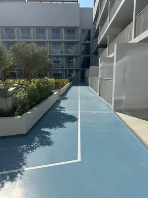 an empty hallway of an apartment building at Cosy Studio - Luma 22 in Dubai