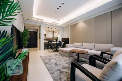 a living room with a couch and a table at Luxurious - Comfy 2BR in Business Bay - City Views in Dubai