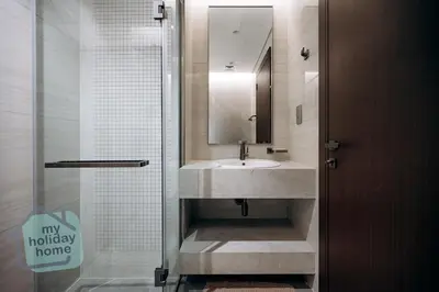 a bathroom with a sink and a mirror at Luxurious - Comfy 2BR in Business Bay - City Views in Dubai