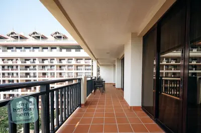 a corridor of a building with a balcony at Steps to Beach - Resort Residence - Palm Jumeirah in Dubai