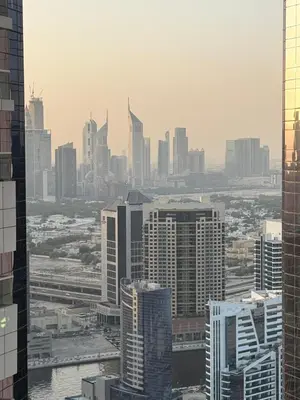 an aerial view of a city with tall buildings at 4905 Luxury View By Royal Sky Vacation Homes Paramount Tower A in Dubai