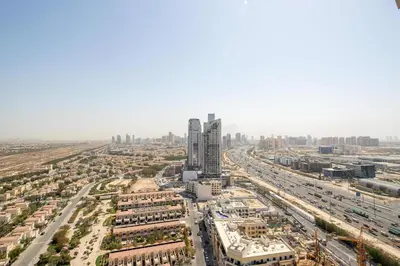 an aerial view of a city with buildings and roads at Frank Porter - Al Jawhara Tower in Dubai